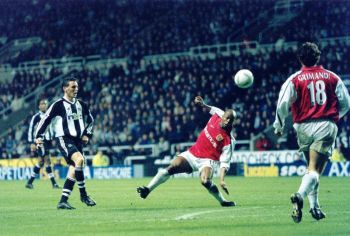 Wiltord fails to stop a McClen chip as Grimandi looks on, F.A. Cup 6th Round 1-1 draw v Arsenal. - Click to enlarge